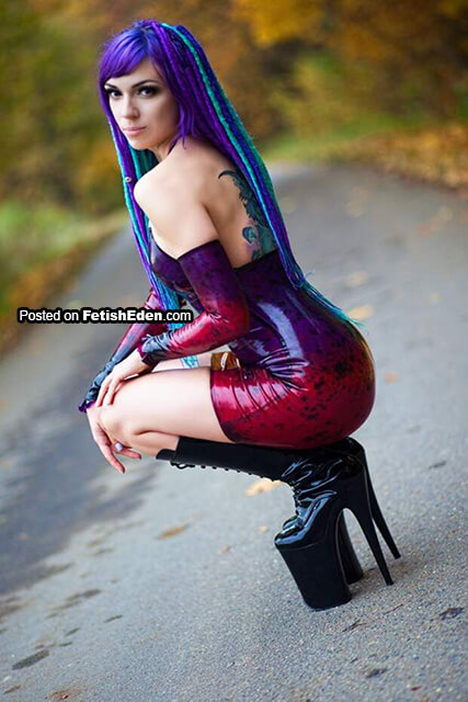 Octokuro purple hair lady wearing transparent red and purple latex mini-dress and long black PVC boots