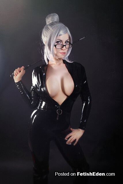 Elena Samko platinum blonde Mistress in black latex catsuit