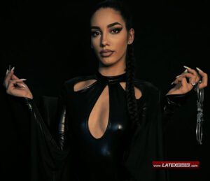 Mistress with handcuffs wearing wetlook