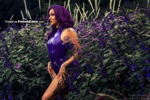 Elegy Ellem purple hair lady in violet latex bodysuit outdoors