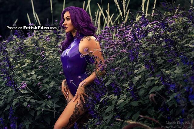 Elegy Ellem purple hair lady in violet latex bodysuit outdoors